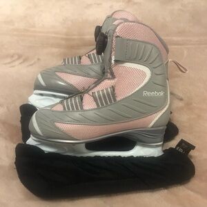 Big girl size 3 
Reebok pink and grey no-tie skates